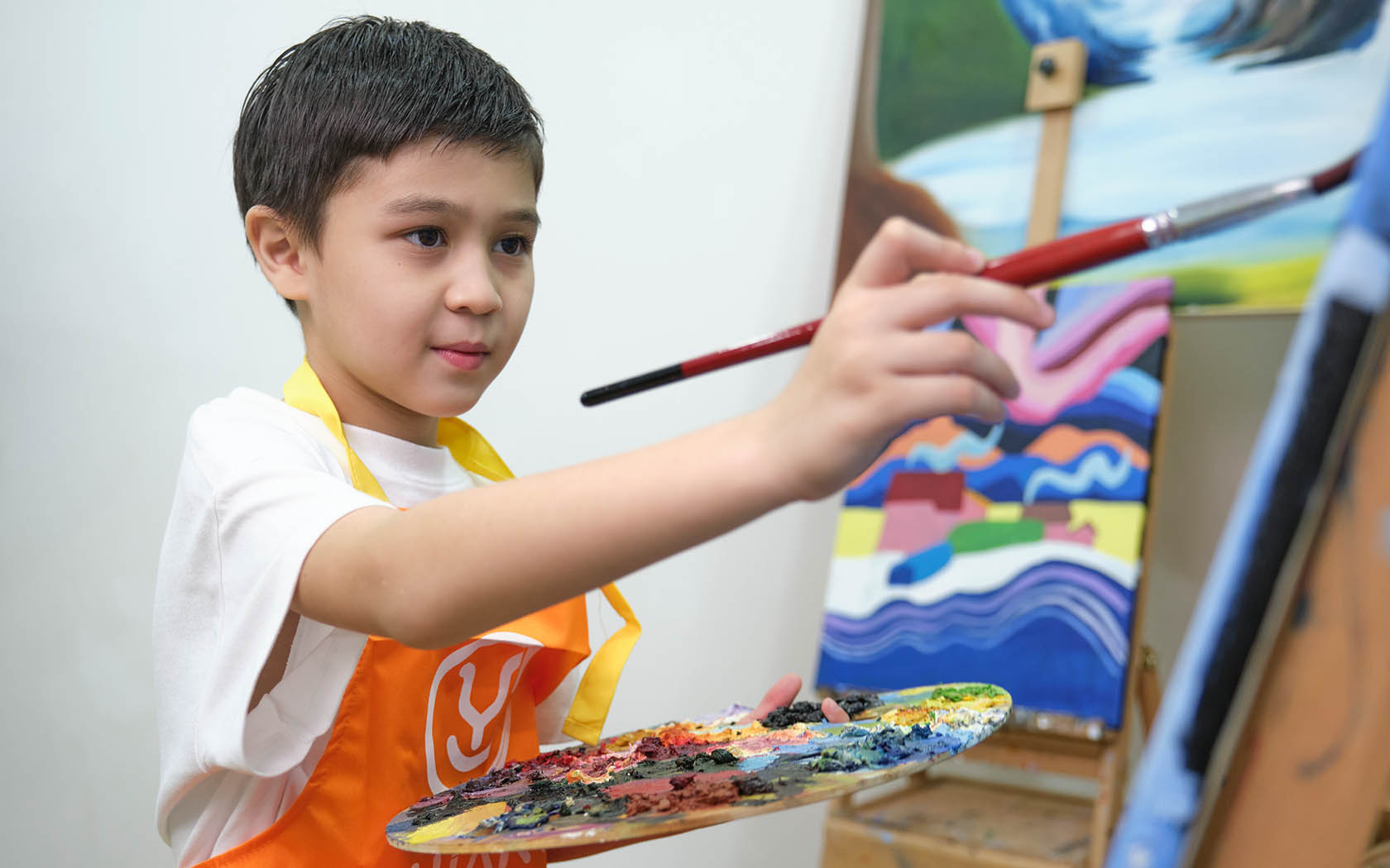 Image of child painting