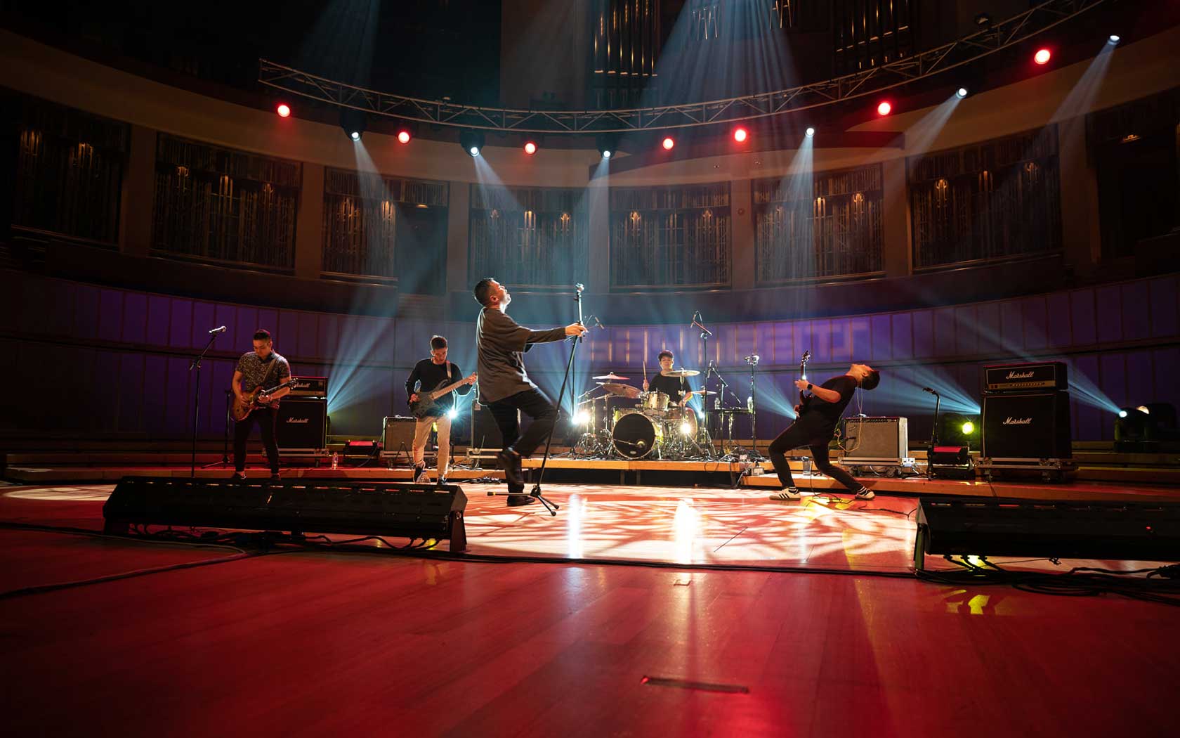 Image of heavy rock band performing at the Concert Hall during Baybeats.