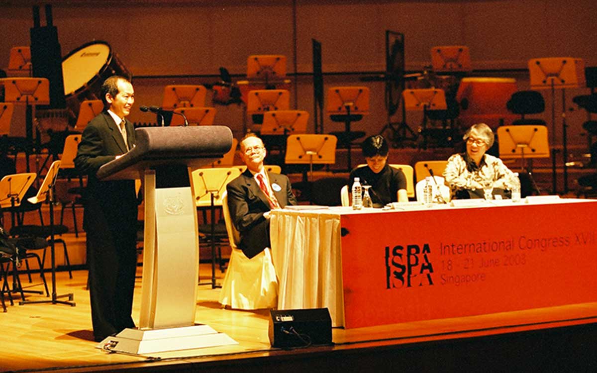 Image of then CEO Benson Puah giving a speech with guests at ISPA. 