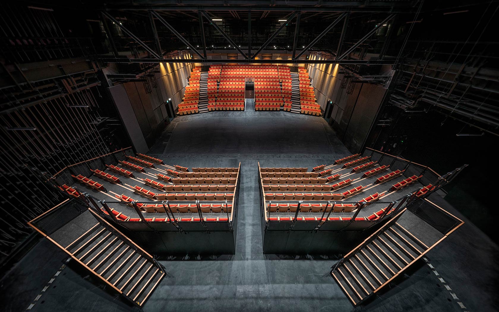 Image of the interior of the Singtel Waterfront Theatre with seats configured in traverse.