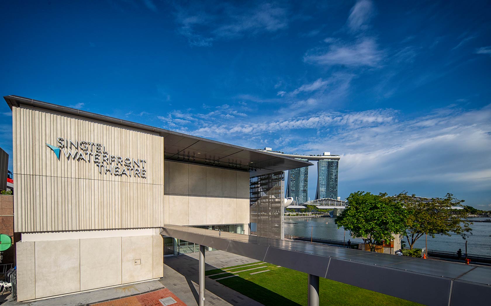 Image of the Singtel Waterfront Theatre in the day taken against the Marina Bay waterfront.