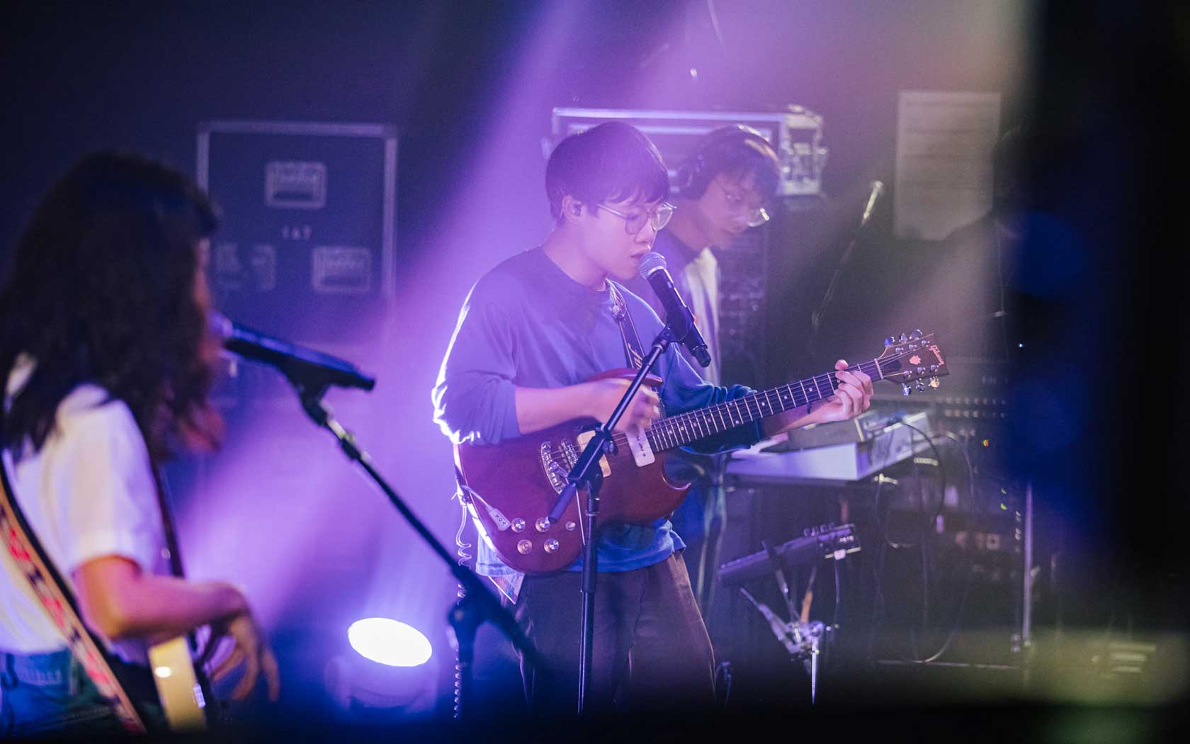 Image of musicians in a band performing at Baybeats.